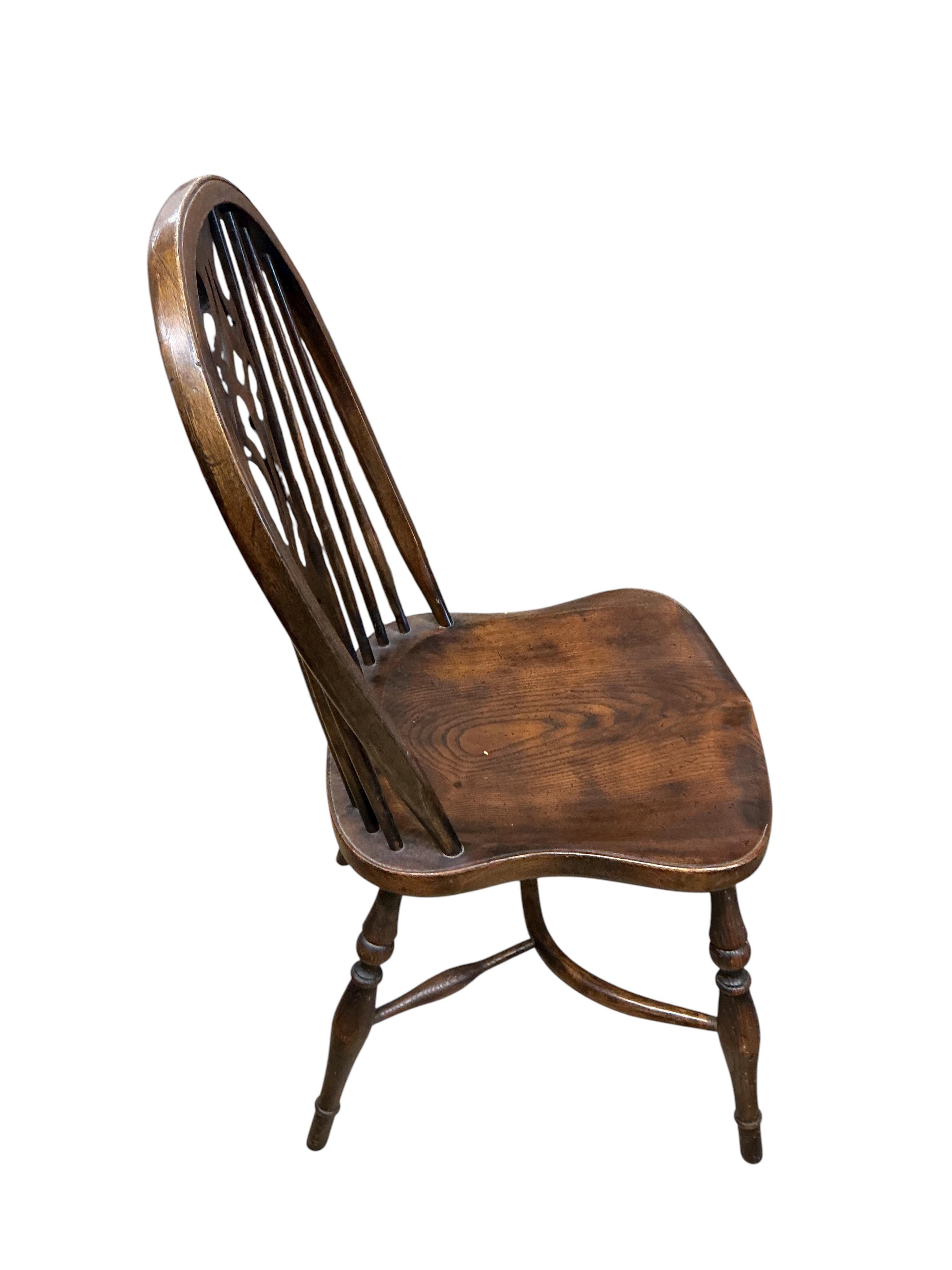 A set of six reproduction ash and elm Windsor dining chairs with crinoline stretchers, width 48cm, depth 46cm, height 99cm